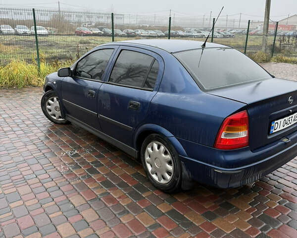 Синий Опель Астра, объемом двигателя 1.39 л и пробегом 210 тыс. км за 3299 $, фото 8 на Automoto.ua