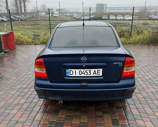 Синий Опель Астра, объемом двигателя 1.39 л и пробегом 210 тыс. км за 3299 $, фото 7 на Automoto.ua