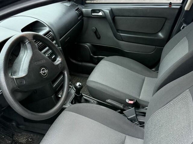 Синий Опель Астра, объемом двигателя 1.4 л и пробегом 210 тыс. км за 3300 $, фото 5 на Automoto.ua