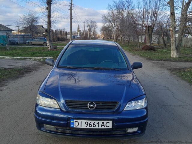 Синий Опель Астра, объемом двигателя 1.6 л и пробегом 365 тыс. км за 3000 $, фото 1 на Automoto.ua