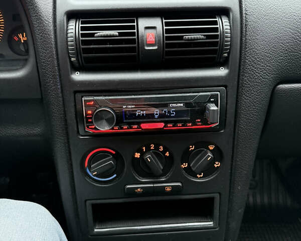 Синий Опель Астра, объемом двигателя 1.39 л и пробегом 210 тыс. км за 3299 $, фото 24 на Automoto.ua