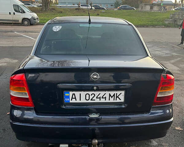 Синий Опель Астра, объемом двигателя 1.36 л и пробегом 250 тыс. км за 2700 $, фото 4 на Automoto.ua