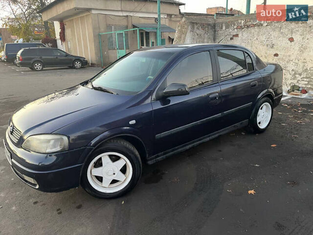 Синий Опель Астра, объемом двигателя 1.36 л и пробегом 250 тыс. км за 2700 $, фото 3 на Automoto.ua