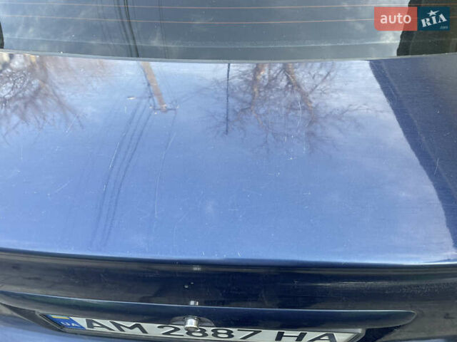 Синий Опель Астра, объемом двигателя 1.39 л и пробегом 330 тыс. км за 3100 $, фото 5 на Automoto.ua