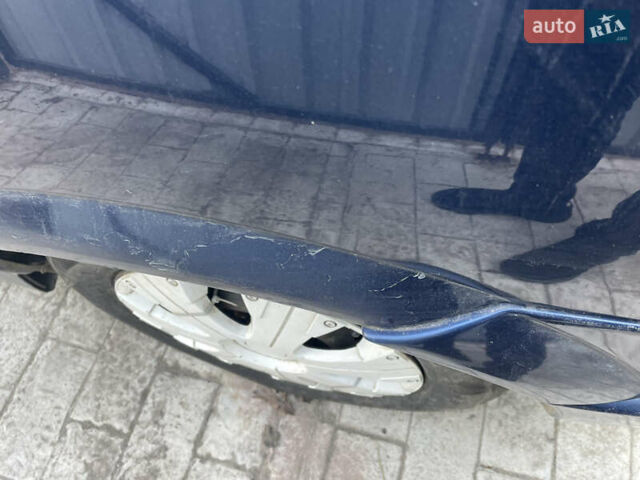 Синий Опель Астра, объемом двигателя 1.39 л и пробегом 330 тыс. км за 3100 $, фото 4 на Automoto.ua