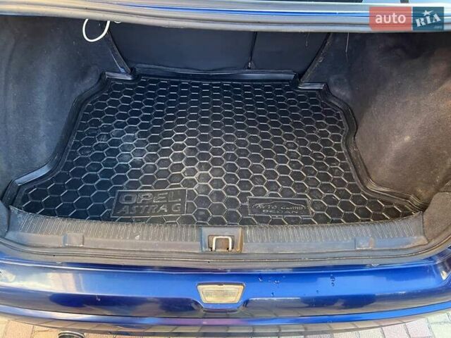 Опель Астра 2005 в Шепетовке на Automoto.ua Синий Опель Астра, объемом двигателя 1.4 л и пробегом 209 тыс. км за 4300 $, фото 12 на Automoto.ua