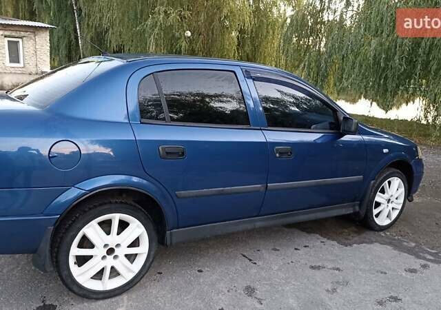 Синій Опель Астра, об'ємом двигуна 1.39 л та пробігом 352 тис. км за 3100 $, фото 6 на Automoto.ua