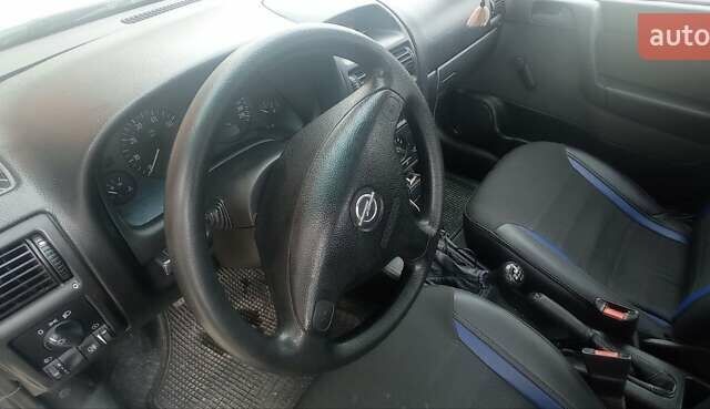 Синій Опель Астра, об'ємом двигуна 1.4 л та пробігом 236 тис. км за 4000 $, фото 10 на Automoto.ua