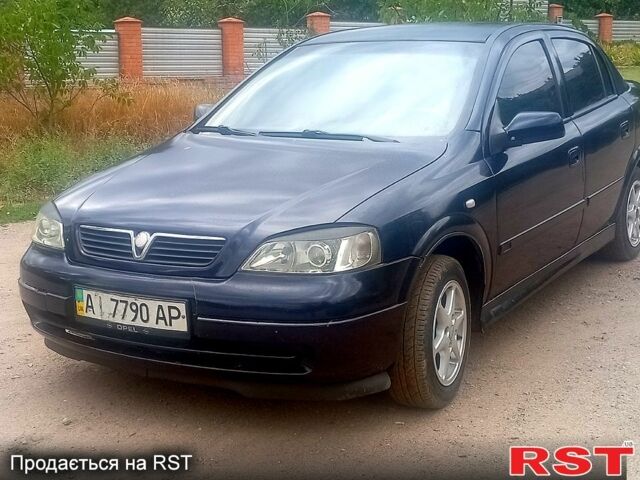 Синий Опель Астра, объемом двигателя 1.4 л и пробегом 208 тыс. км за 2600 $, фото 3 на Automoto.ua