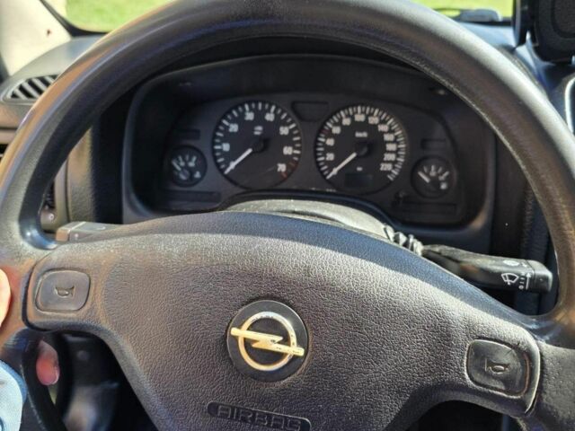 Синий Опель Астра, объемом двигателя 1.4 л и пробегом 227 тыс. км за 2650 $, фото 12 на Automoto.ua