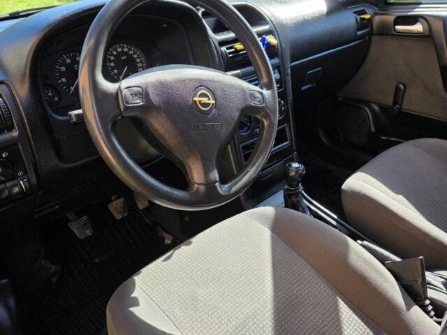 Синий Опель Астра, объемом двигателя 1.4 л и пробегом 227 тыс. км за 2650 $, фото 15 на Automoto.ua