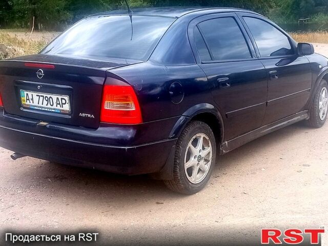 Синий Опель Астра, объемом двигателя 1.4 л и пробегом 208 тыс. км за 2600 $, фото 4 на Automoto.ua