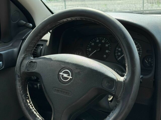 Синий Опель Астра, объемом двигателя 1.4 л и пробегом 284 тыс. км за 2550 $, фото 4 на Automoto.ua