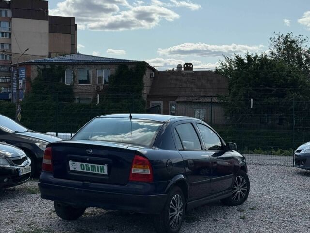 Синий Опель Астра, объемом двигателя 1.4 л и пробегом 284 тыс. км за 2550 $, фото 1 на Automoto.ua
