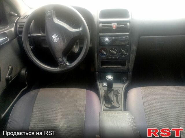 Синий Опель Астра, объемом двигателя 1.4 л и пробегом 208 тыс. км за 2600 $, фото 6 на Automoto.ua