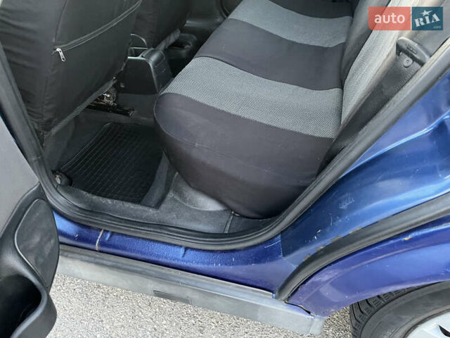 Синий Опель Астра, объемом двигателя 1.4 л и пробегом 360 тыс. км за 2450 $, фото 21 на Automoto.ua