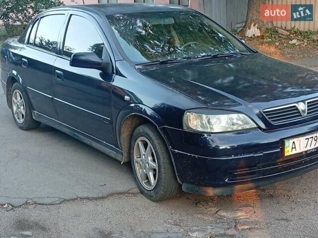 Синій Опель Астра, об'ємом двигуна 1.4 л та пробігом 208 тис. км за 2900 $, фото 9 на Automoto.ua
