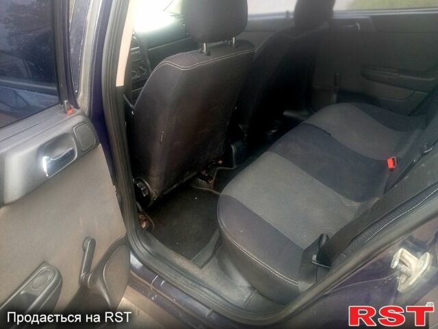 Синий Опель Астра, объемом двигателя 1.4 л и пробегом 208 тыс. км за 2600 $, фото 7 на Automoto.ua