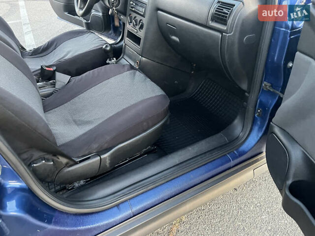 Синий Опель Астра, объемом двигателя 1.4 л и пробегом 360 тыс. км за 2450 $, фото 20 на Automoto.ua