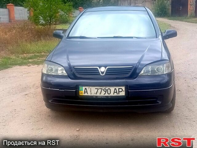 Синий Опель Астра, объемом двигателя 1.4 л и пробегом 208 тыс. км за 2600 $, фото 2 на Automoto.ua
