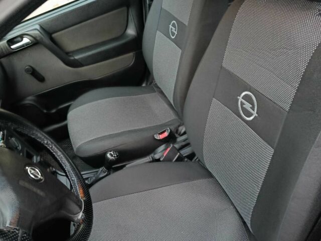 Синий Опель Астра, объемом двигателя 1.4 л и пробегом 116 тыс. км за 3430 $, фото 4 на Automoto.ua