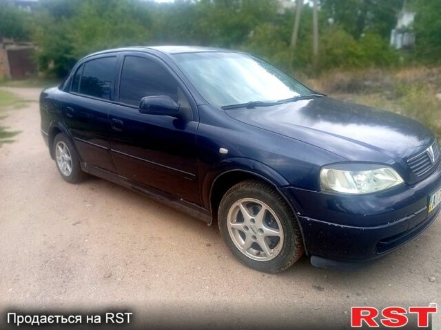 Синий Опель Астра, объемом двигателя 1.4 л и пробегом 208 тыс. км за 2600 $, фото 1 на Automoto.ua