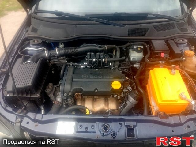 Синий Опель Астра, объемом двигателя 1.4 л и пробегом 208 тыс. км за 2600 $, фото 5 на Automoto.ua