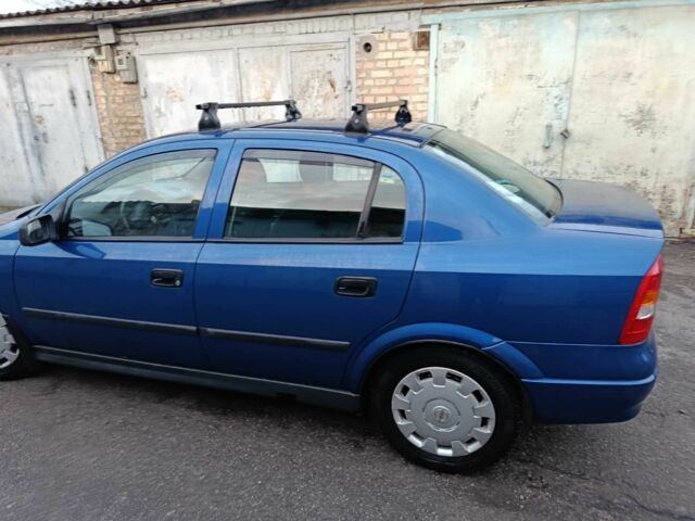 Синий Опель Астра, объемом двигателя 1.4 л и пробегом 116 тыс. км за 3430 $, фото 6 на Automoto.ua