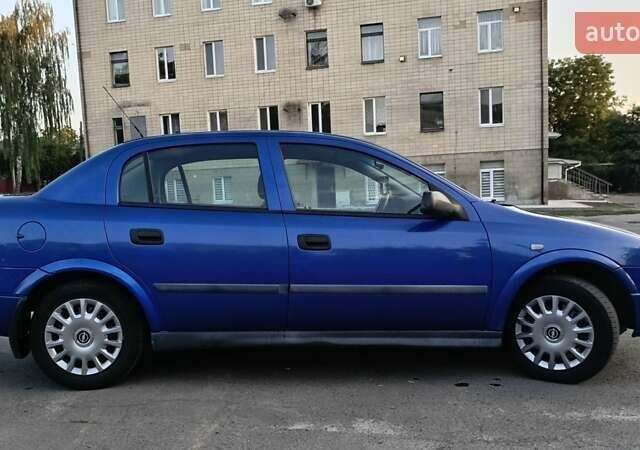 Синій Опель Астра, об'ємом двигуна 1.39 л та пробігом 250 тис. км за 2750 $, фото 4 на Automoto.ua