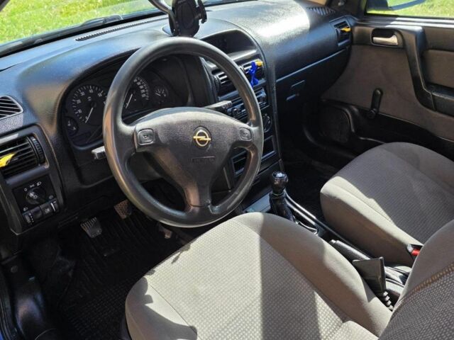 Синий Опель Астра, объемом двигателя 1.4 л и пробегом 227 тыс. км за 2650 $, фото 10 на Automoto.ua