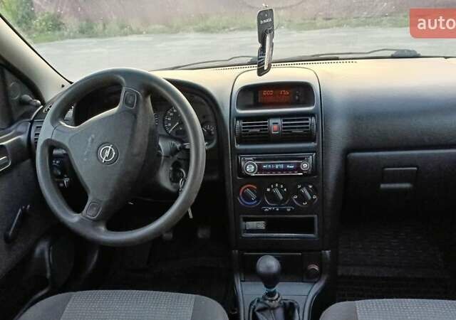 Синій Опель Астра, об'ємом двигуна 1.39 л та пробігом 250 тис. км за 2750 $, фото 7 на Automoto.ua