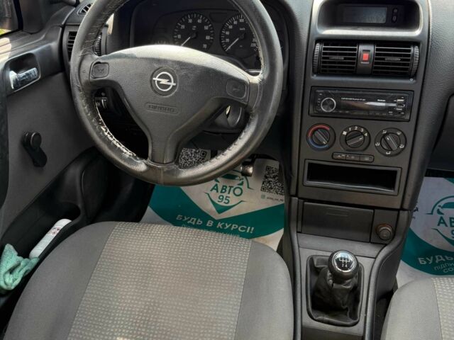 Синий Опель Астра, объемом двигателя 1.4 л и пробегом 284 тыс. км за 2550 $, фото 5 на Automoto.ua