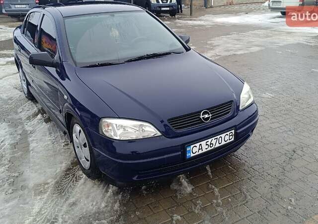 Синий Опель Астра, объемом двигателя 1.36 л и пробегом 268 тыс. км за 4000 $, фото 14 на Automoto.ua