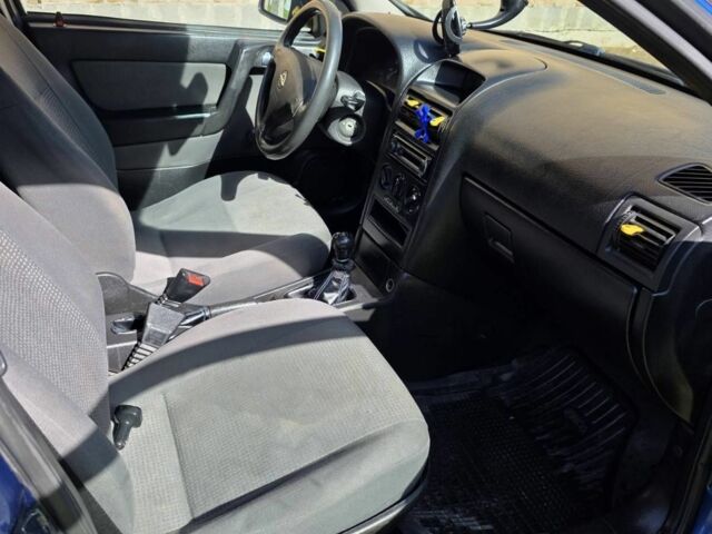 Синий Опель Астра, объемом двигателя 1.4 л и пробегом 227 тыс. км за 2650 $, фото 14 на Automoto.ua