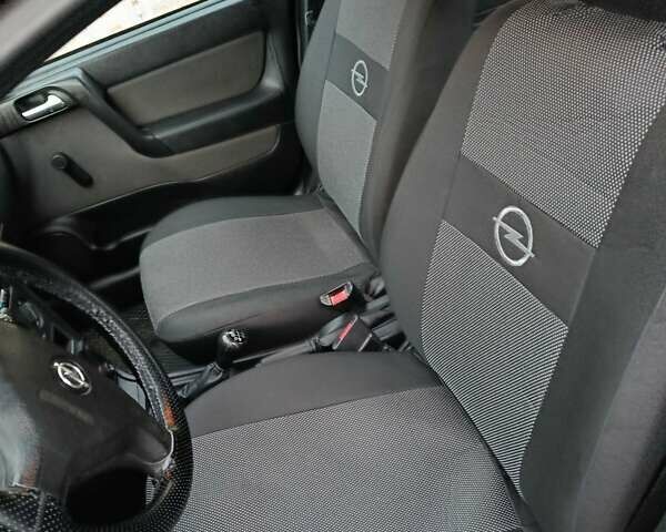 Синій Опель Астра, об'ємом двигуна 1.4 л та пробігом 116 тис. км за 3430 $, фото 3 на Automoto.ua