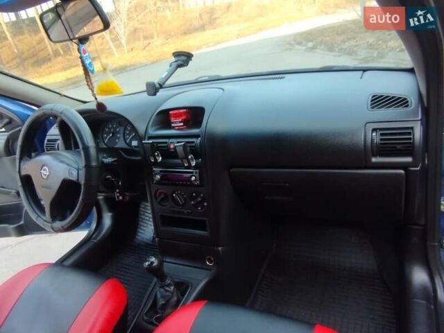 Синий Опель Астра, объемом двигателя 1.4 л и пробегом 182 тыс. км за 3300 $, фото 23 на Automoto.ua