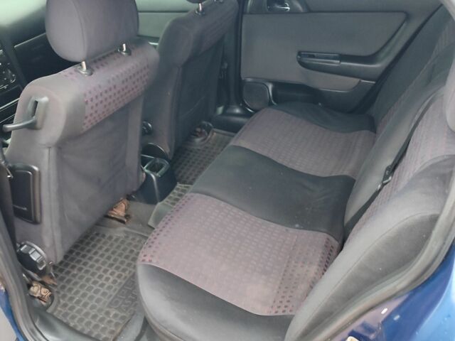 Синий Опель Астра, объемом двигателя 1.4 л и пробегом 280 тыс. км за 3450 $, фото 5 на Automoto.ua