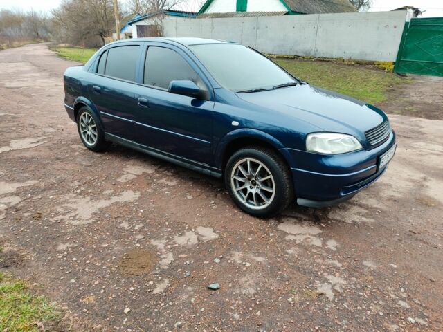 Синий Опель Астра, объемом двигателя 1.4 л и пробегом 280 тыс. км за 3450 $, фото 1 на Automoto.ua