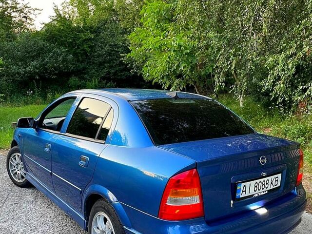 Синий Опель Астра, объемом двигателя 1.4 л и пробегом 300 тыс. км за 3400 $, фото 2 на Automoto.ua