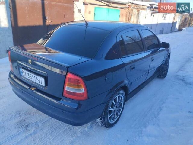 Синий Опель Астра, объемом двигателя 1.4 л и пробегом 180 тыс. км за 3500 $, фото 5 на Automoto.ua
