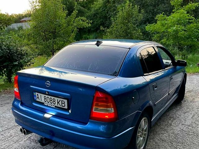 Синий Опель Астра, объемом двигателя 1.4 л и пробегом 300 тыс. км за 3400 $, фото 3 на Automoto.ua