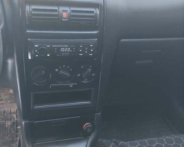 Синий Опель Астра, объемом двигателя 1.4 л и пробегом 180 тыс. км за 3500 $, фото 14 на Automoto.ua