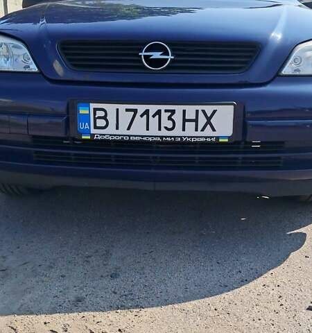 Синий Опель Астра, объемом двигателя 1.4 л и пробегом 32 тыс. км за 3600 $, фото 4 на Automoto.ua
