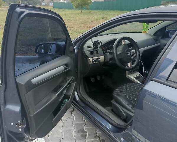 Синий Опель Астра, объемом двигателя 1.8 л и пробегом 295 тыс. км за 5800 $, фото 8 на Automoto.ua
