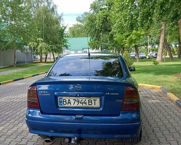 Синий Опель Астра, объемом двигателя 1.4 л и пробегом 216 тыс. км за 4599 $, фото 7 на Automoto.ua