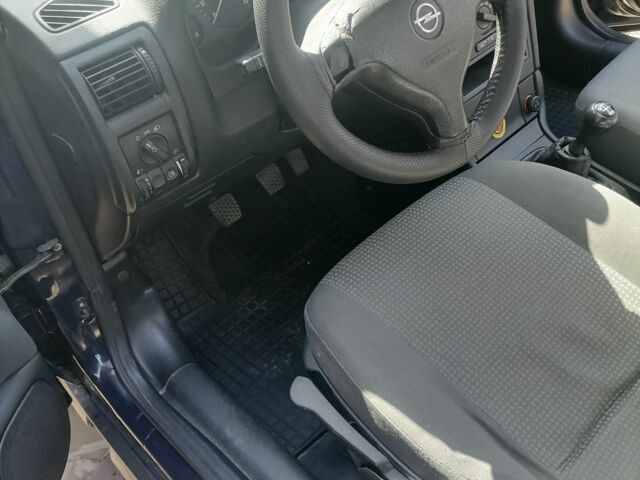 Синий Опель Астра, объемом двигателя 1.6 л и пробегом 215 тыс. км за 3000 $, фото 14 на Automoto.ua