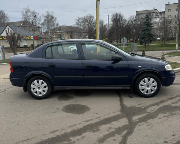 Синий Опель Астра, объемом двигателя 1.36 л и пробегом 279 тыс. км за 3900 $, фото 3 на Automoto.ua