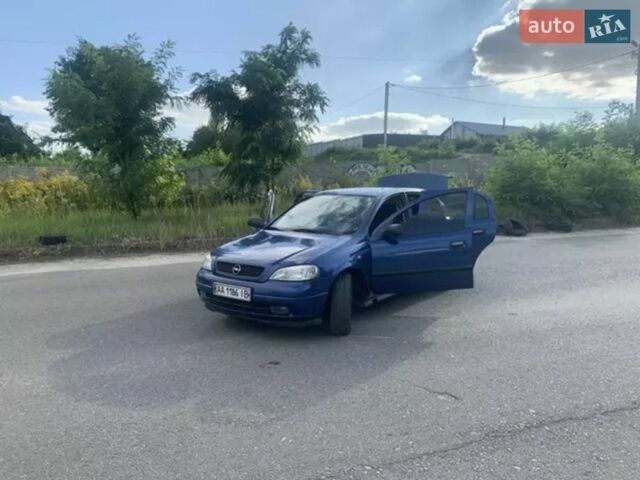 Синий Опель Астра, объемом двигателя 1.39 л и пробегом 320 тыс. км за 3500 $, фото 7 на Automoto.ua