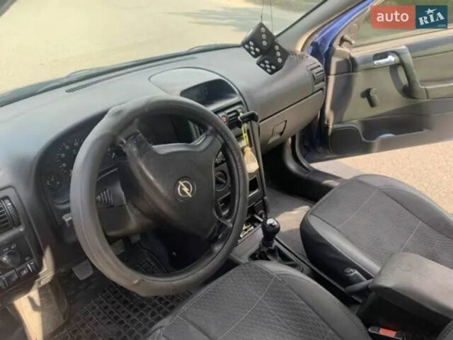Синій Опель Астра, об'ємом двигуна 1.39 л та пробігом 320 тис. км за 2400 $, фото 8 на Automoto.ua