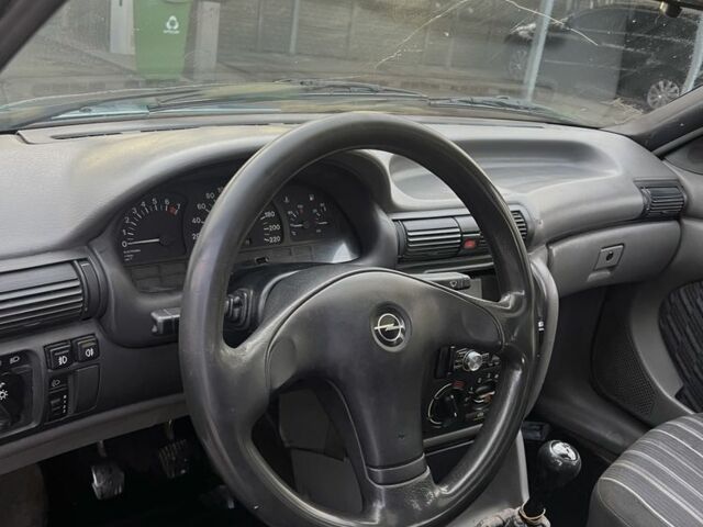 Синій Опель Астра, об'ємом двигуна 2 л та пробігом 250 тис. км за 597 $, фото 6 на Automoto.ua